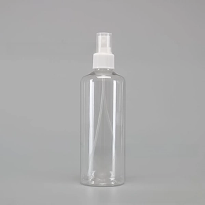 Detailed macro of a clear 10-100ml PET spray bottle with a white fine mist pump