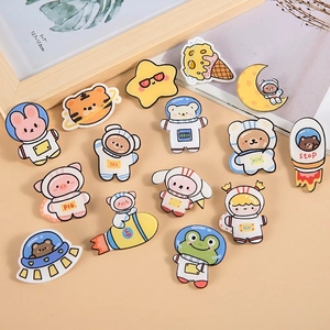Cute acrylic astronaut animal brooches featuring rabbit and bear space designs