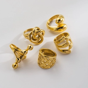 Minimalist 18k gold plated stainless steel rings featuring ball and twisted wreath designs