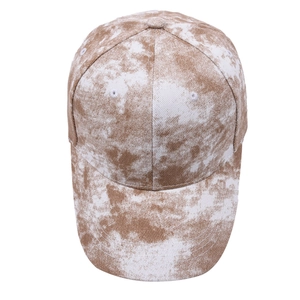 Brown and white tie-dye cotton baseball cap with curved brim and six-panel crown