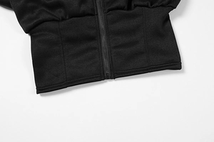Close-up of a high-quality black zipper and neat stitching on a knitted athletic jacket