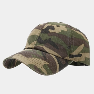 Detail view of camouflage baseball cap showing canvas texture and 6-panel stitching