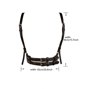 Detail view of black punk style leather corset belt with size labels and metal buckles