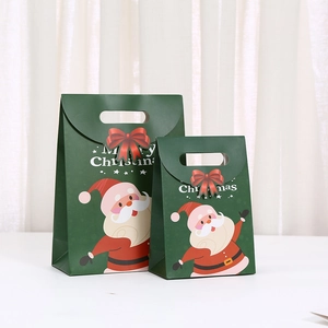 Detail of dark green Christmas gift bags with Santa Claus prints in two different sizes