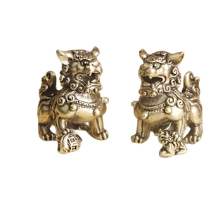 Pair of vintage brass lion statues with exquisite traditional Chinese carvings