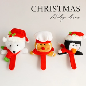Christmas plush slap bracelets featuring polar bear, gingerbread man, and penguin characters