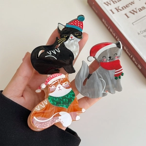 Three-piece set of cat-shaped hair clips with festive Christmas hats and colorful scarves