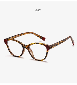 Detail of retro cat-eye glasses with leopard tortoiseshell pattern at a 45-degree angle