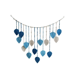 Bohemian handmade macrame wall hanging with gradient blue woven leaves and wood beads