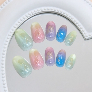 Pastel gradient press on nails with relief portrait designs on a mirror surface
