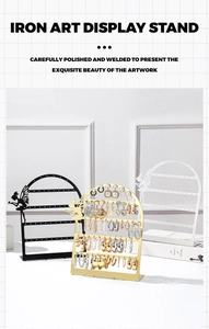 Detail of three-color metal earring display stand with elegant fairy side decorations