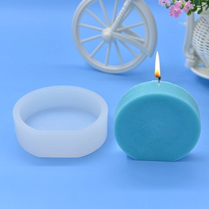 Circular wave geometric silicone mold for DIY candles and plaster crafts with light blue candle