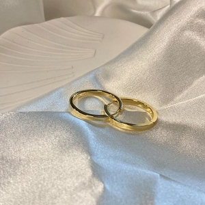 French style S925 sterling silver hoop earrings in gold finish on white silk