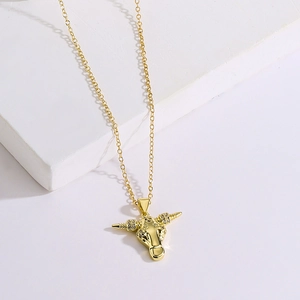 18K gold plated bull head pendant necklace with micro-inlaid crystals on white stone