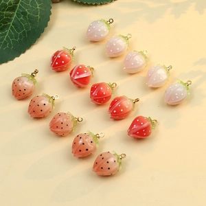 Handmade strawberry charms in red and pink resin with gold loops for DIY jewelry making