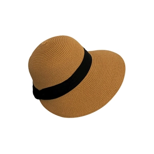 Hepburn style wide brim straw sun hat with black ribbon for beach holiday
