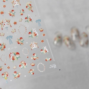 Ultra-thin nail art stickers with cute peach, white rabbit, and blue bow patterns