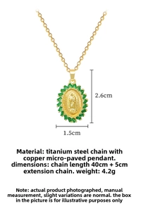 Detailed view of oval gold portrait pendant with green crystals and dimension markings