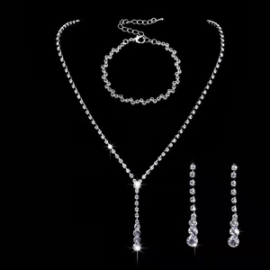 Elegant silver bridal jewelry set with sparkling rhinestones necklace bracelet and earrings