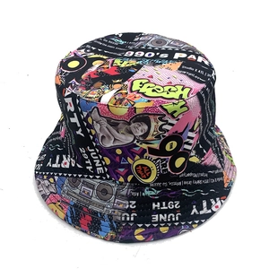Close-up of 90's Party graffiti print on durable canvas reversible bucket hat fabric