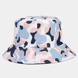 Detail view of colorful camo bucket hat showing high-density canvas texture and neat stitching