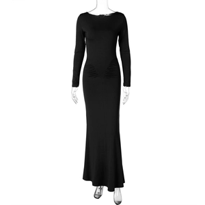 Detail of waist ruching and slim fit design on black long sleeve maxi dress