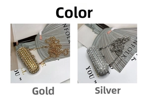 Detail view of gold and silver capsule clutches with sparkling rhinestones and metal chain