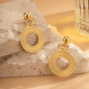 Gold plated titanium steel hoop earrings with layered concentric circles design