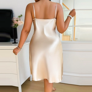Champagne gold silk satin nightgown featuring elegant thin straps and a midi A-line fit