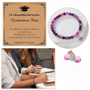 Natural stone bead bracelet with ladybug charm on graduation gift card display