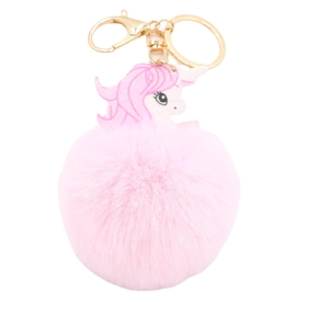 Pink unicorn pom pom keychain with glitter horn and golden metal clip on white background