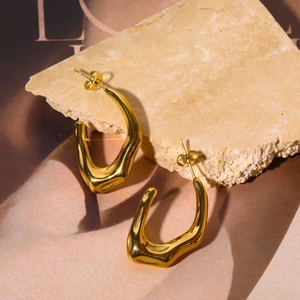 Modern 18K gold plated bamboo wrap earrings with a liquid metal lava aesthetic for women