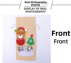 Front detail of a burlap Christmas wine bottle bag with cute 3D bear and tree applique