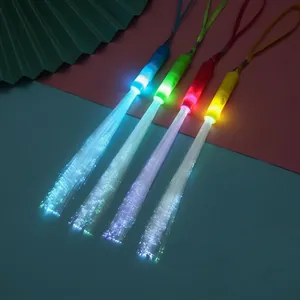 Colorful LED fiber optic wands in four glowing colors for concert and event cheering