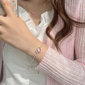 Set di gioielli a cuore pesca con gemme rosa e perle sintetiche per donne eleganti