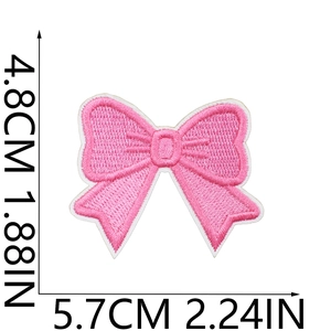 Pink bow embroidery patch dimensions detail showing 4.8cm height and 5.7cm width measurements
