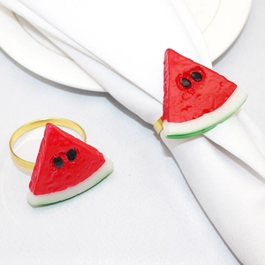 Watermelon slice napkin rings with gold metal bands for summer table decoration