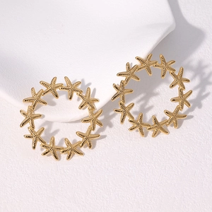 Golden starfish hoop earrings in high-quality stainless steel with minimalist design