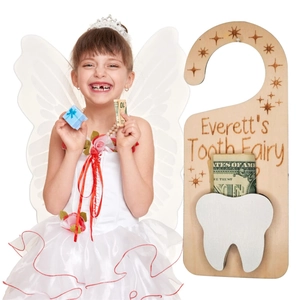 Wooden tooth fairy door hanger with pocket and Everett's custom engraving for kids