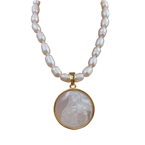 Vintage freshwater pearl necklace with gold Virgin Mary shell pendant in central view