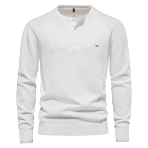 Detail of white men's long sleeve henley sweater with buttoned neck and ribbed cuffs