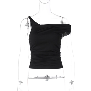 Detail of black one-shoulder cropped top with side ruching in stretchy knit fabric