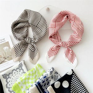 70cm square silk scarf featuring assorted geometric and striped fashion patterns on white
