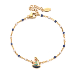 Gold stainless steel sailboat bracelet with blue and white beads for beach vacations