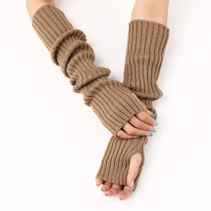 Detailed view of brown ribbed knit arm warmers with thumb holes on white background