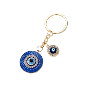 Porte-clés œil protecteur vintage en alliage doré avec émail bleu et strass brillants