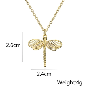 Detailed view of 18K gold plated dragonfly pendant with dimensions 2.6cm by 2.4cm