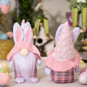 Front and back view of Easter gnome plush with pink checkered hats and bunny ears