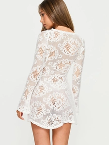 White crochet lace mini dress with flare sleeves and hollow-out design, back view display