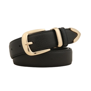 Classic black women's belt with gold pin buckle and lychee leather texture on white background